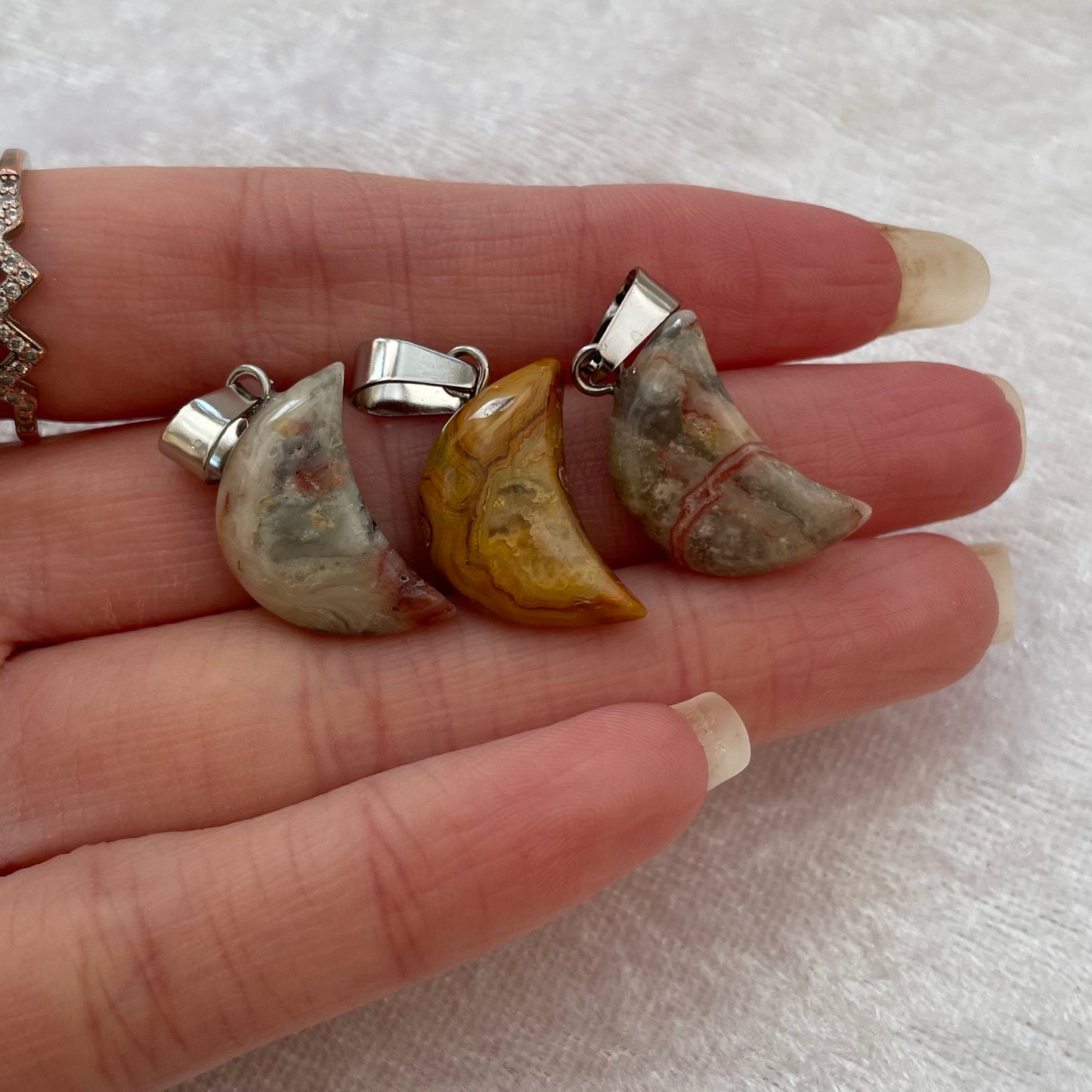Crazy Lace Agate Moon Pendants