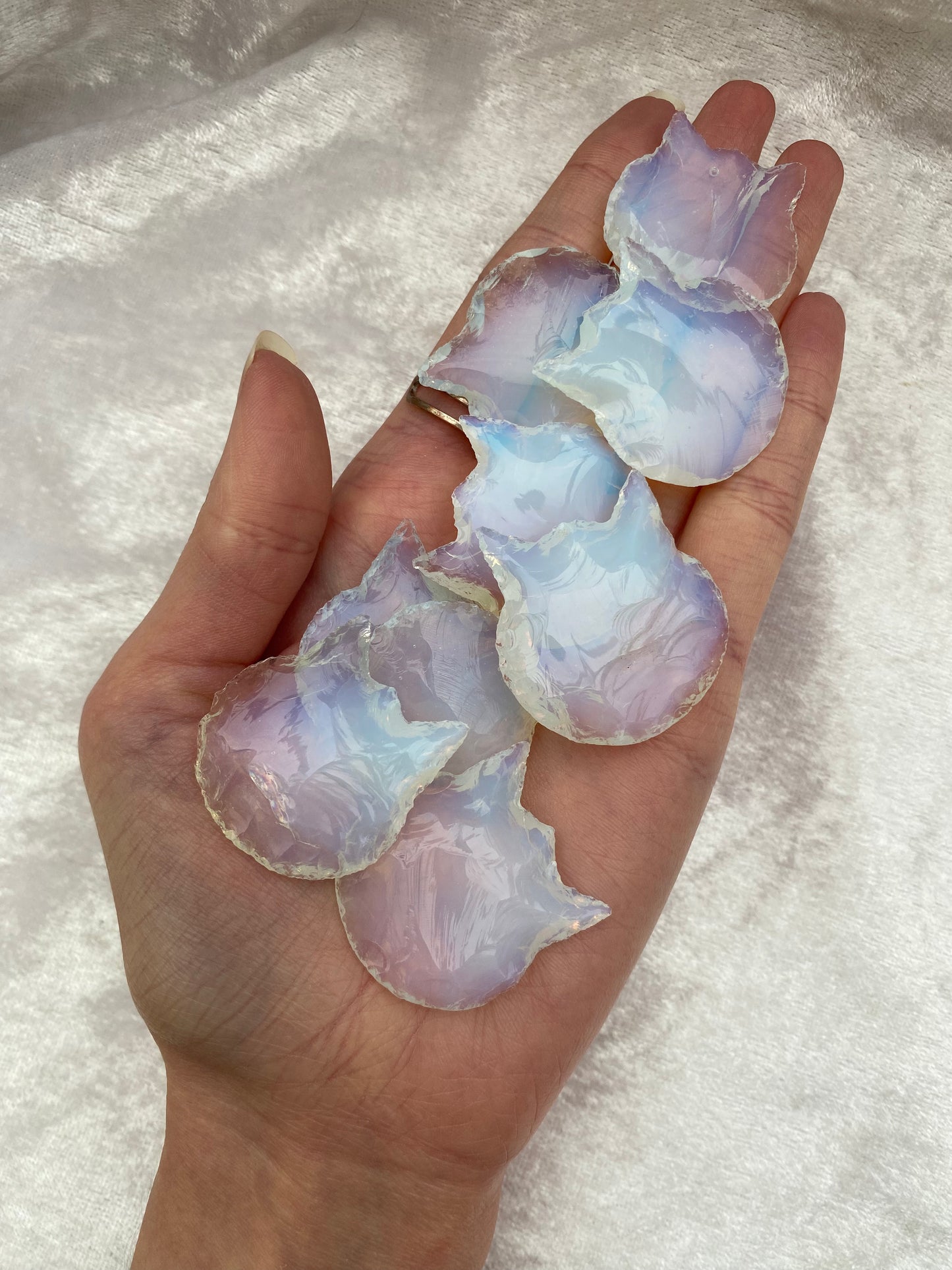 Opalite cat head carvings