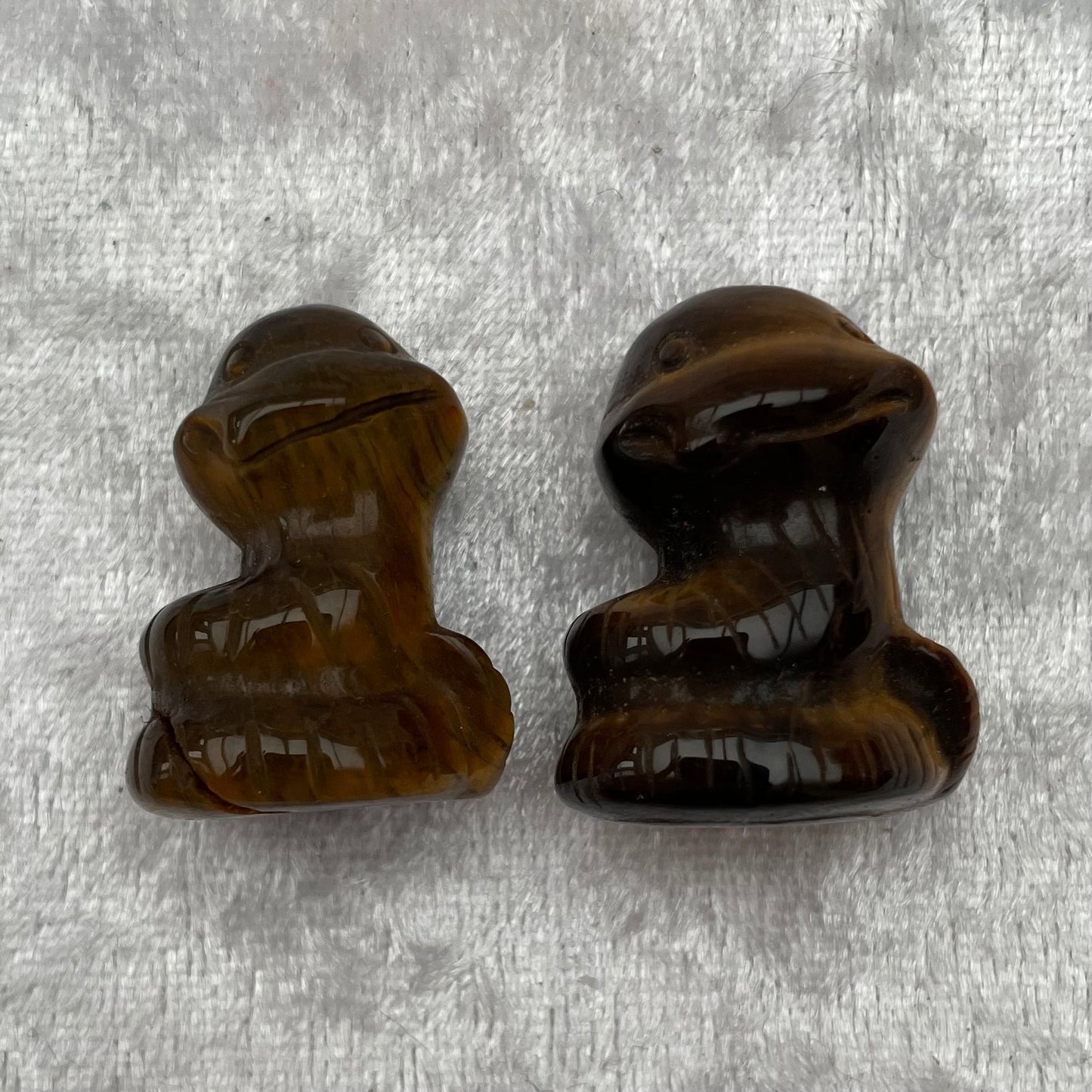 Tigers Eye Snake Carvings