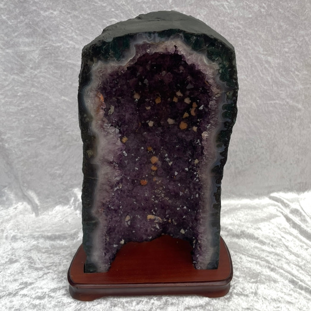 Large 12.1kg Amethyst Cathedral Cluster with Calcite Inclusions on Wooden Base