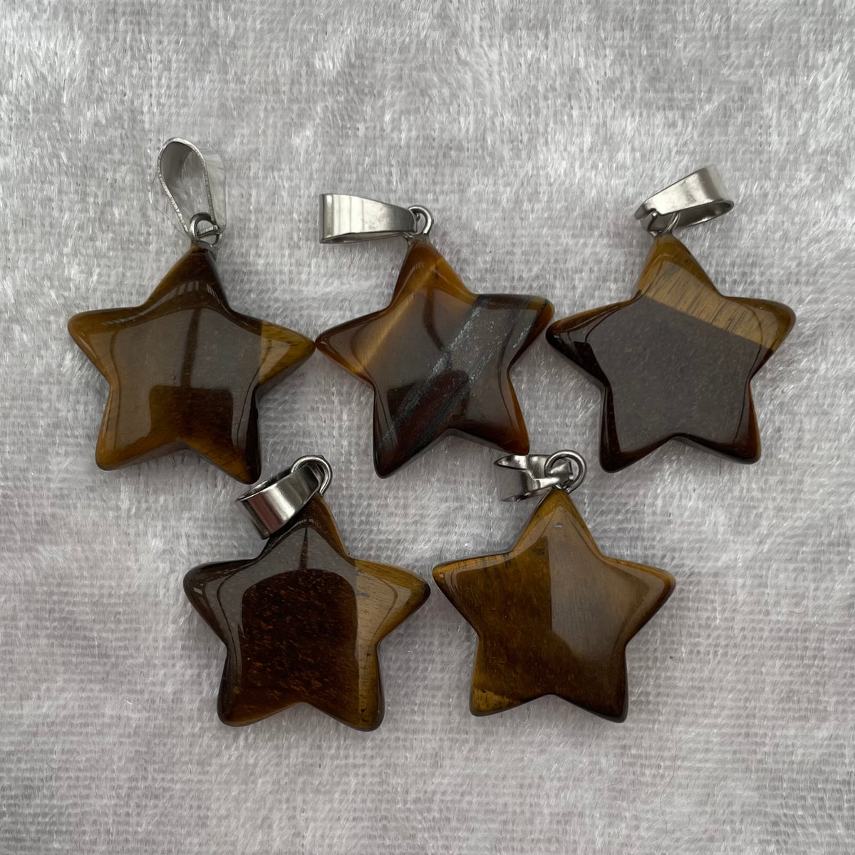 Tigers Eye Star Pendants