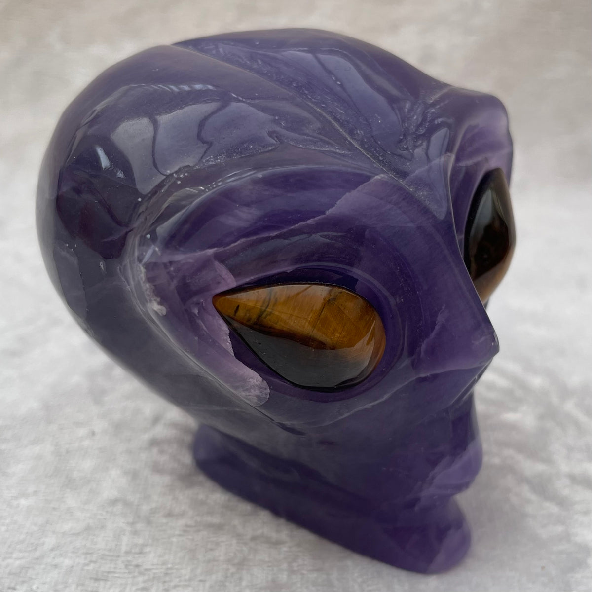Purple Fluorite Alien Skull with Tigers Eye Eyes
