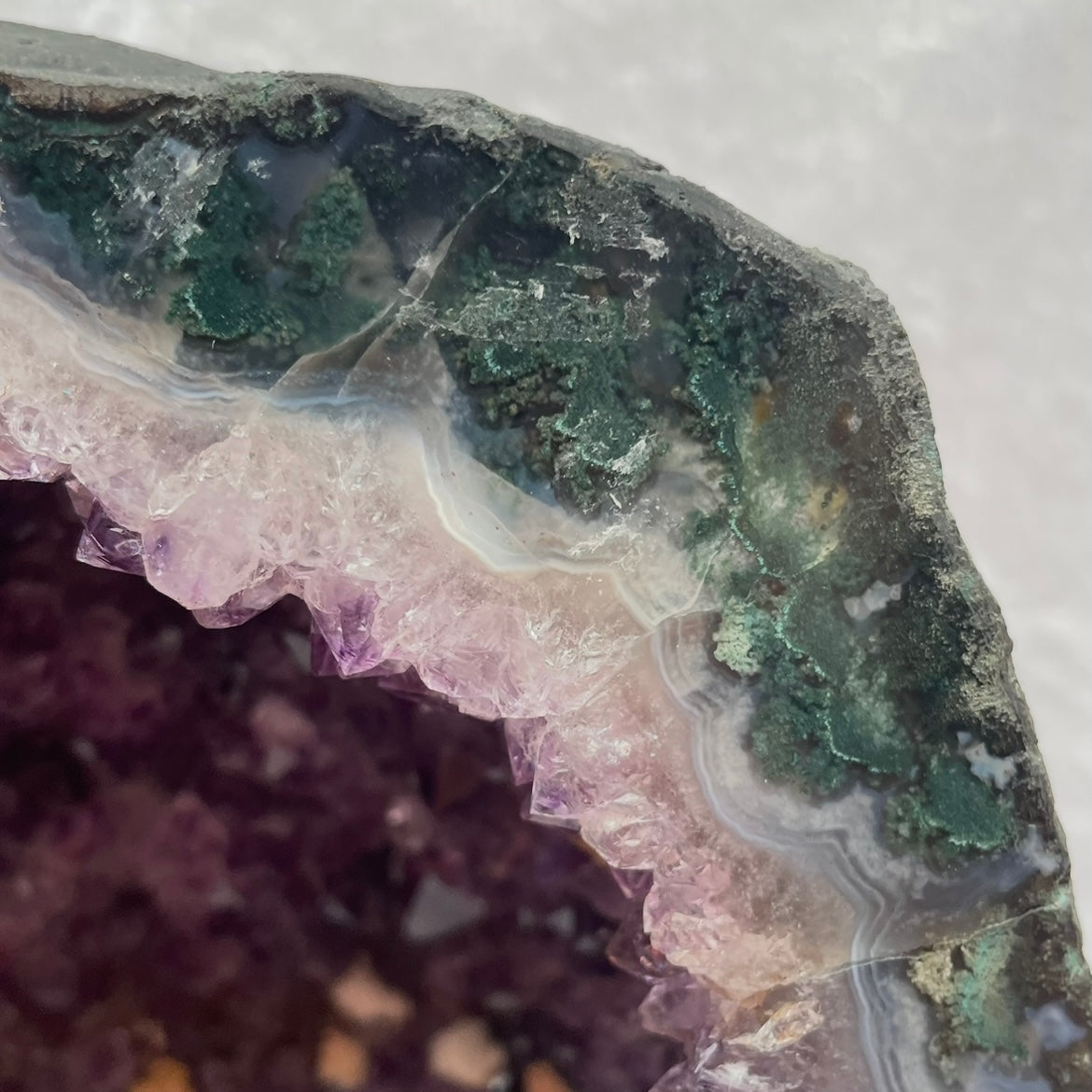 Large 12.1kg Amethyst Cathedral Cluster with Calcite Inclusions on Wooden Base